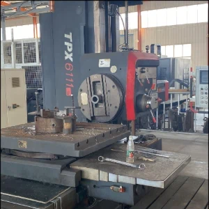 CNC machine processing a valve body